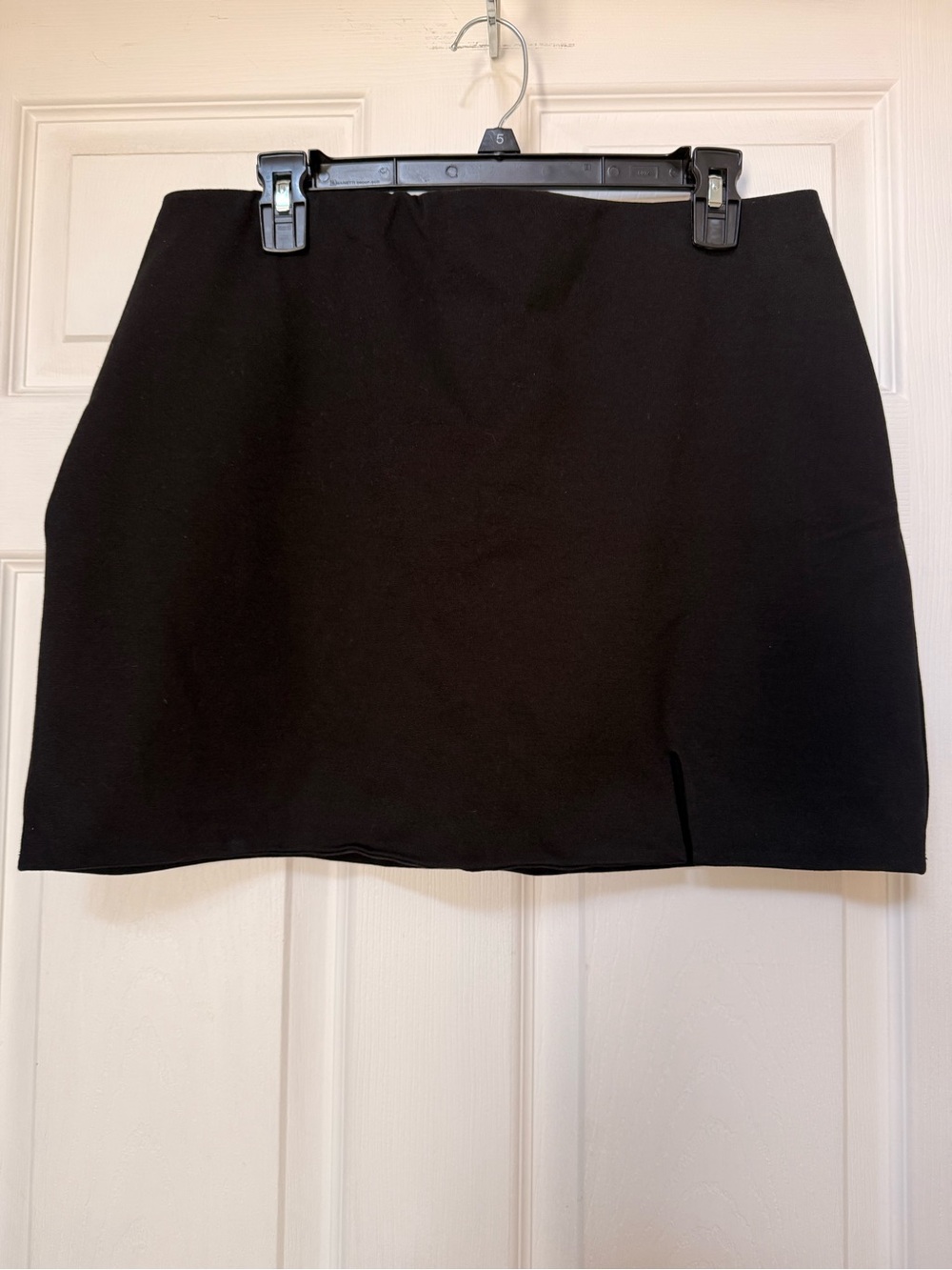 Sleek Black Mini Skirt with Subtle Front Slit with attached shorts